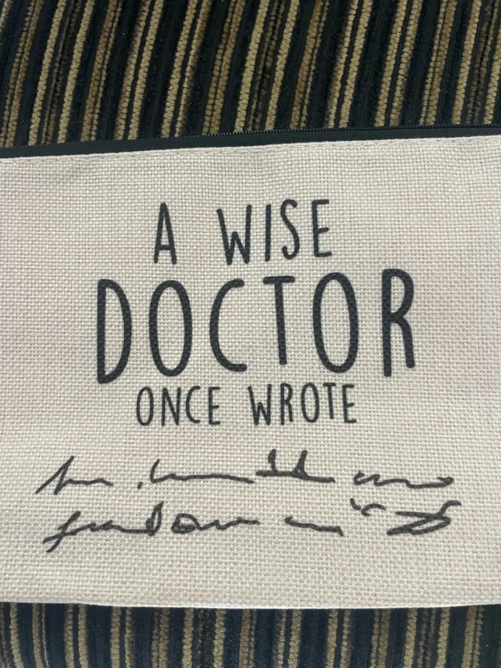 Pink 'A Wise Doctor Once Wrote' Canvas Wristlet
